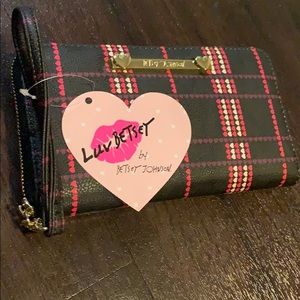 Large black w/ Hearts Betsey Johnson wallet.